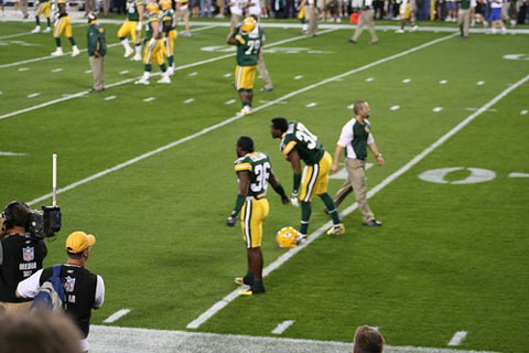 Green Bay secondary stretching before the game.