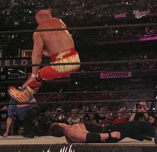 Hulk Hogan hitting his infamous Leg Drop.